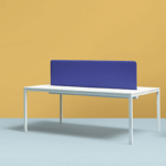 Desk with sound-absorbing partition panels.